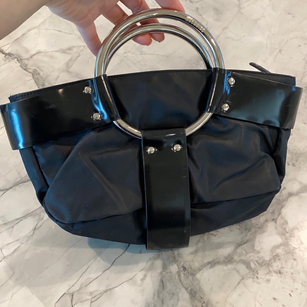 Vintage authentic Moschino metal ring handle bag